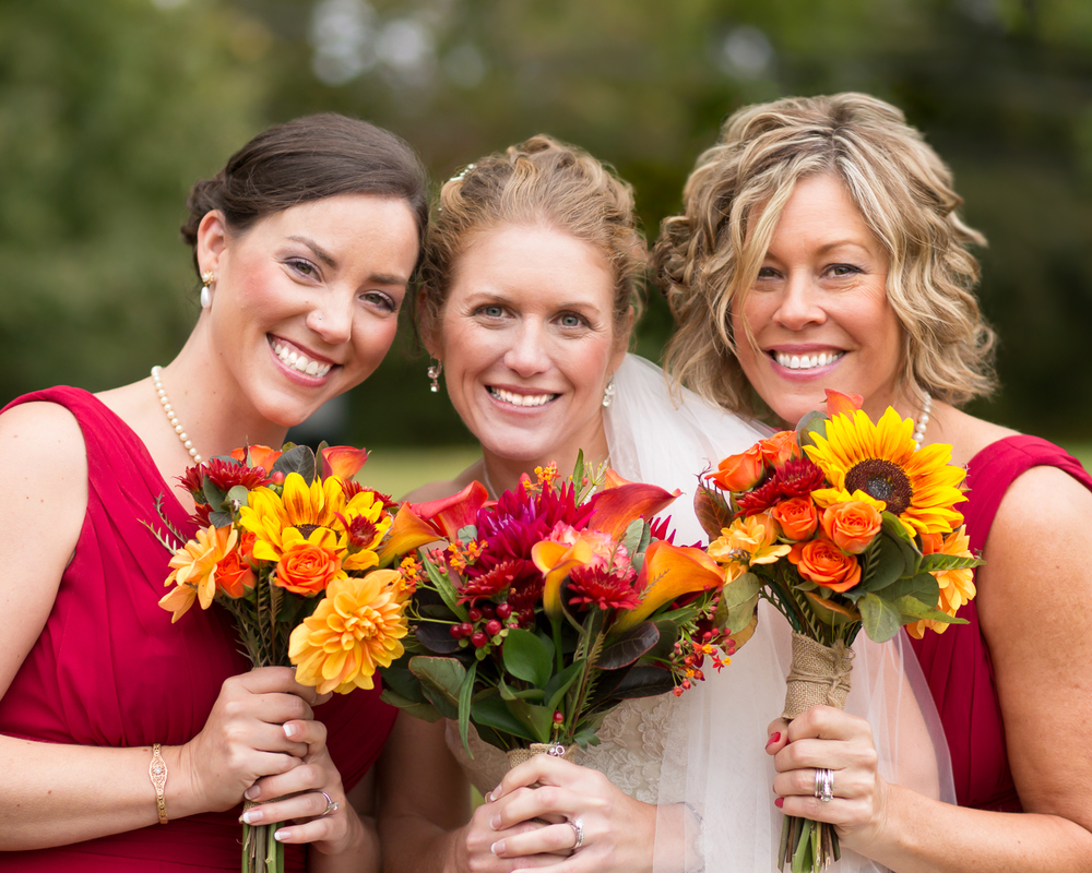 Beautiful bride and the girls with flower bouquets by Garden Gate Florist, Woodstock, CT. 